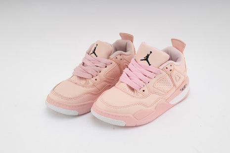 Baskets Air Jordan 11 Rose pour enfant.