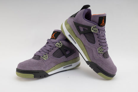 Baskets montantes Air Jordan 4 violet pour femme.