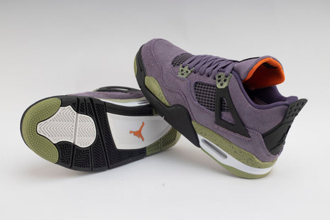 Baskets montantes Air Jordan 4 violet pour femme.