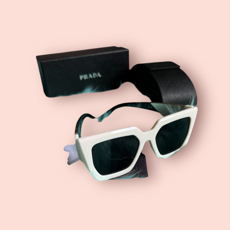 Lunettes de soleil Chic pour femme PRADA.